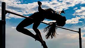 Woman pole vaulting